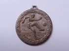 Football old medal
