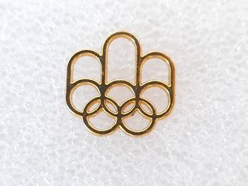 Summer Olympic Games Montreal 1976 logo golden plated pin badge (official product, signed)
